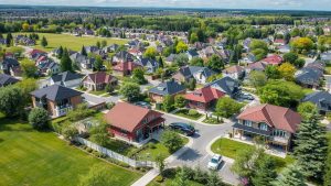Aerial view of residential neighborhood with trees.