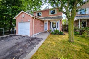 Charming brick house with garage and garden