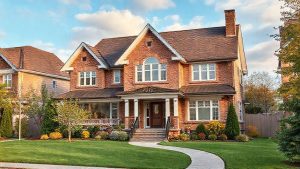 Charming brick house with manicured lawn