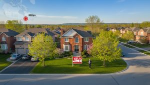 Spring suburban street in Milton, Ontario with a sold sign and GTA map overlay highlighting Milton.
