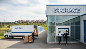 Milton homeowner with moving boxes outside a self-storage facility and moving van