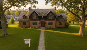 Outdated but structurally sound estate home in Georgetown, Ontario with a For Sale sign